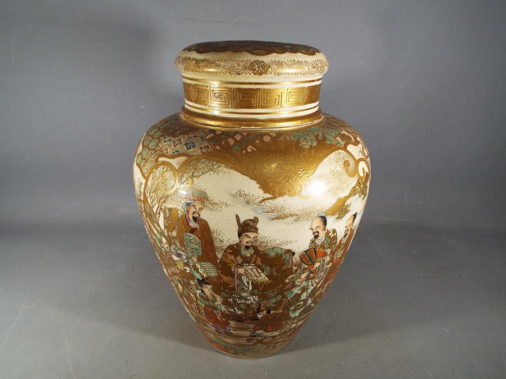 A rare 19th century hand painted Satsuma vase with cover and internal lid,