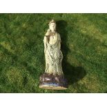 A rare, extremely large Chinese celadon glaze stoneware figurine depicting Guanyin,