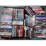 A large quantity of DVD's to include comedies, feature films and similar.