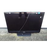 A Sharp Aquos 32" LCD TV,