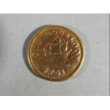 Numismatology - a Gaming Token in the style of a coin, brass 29.4mm.