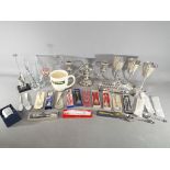 A quantity of plated ware to include goblets, candelabra and similar,