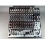 A Behringer Xenyx 2442FX 24 bit mixer.