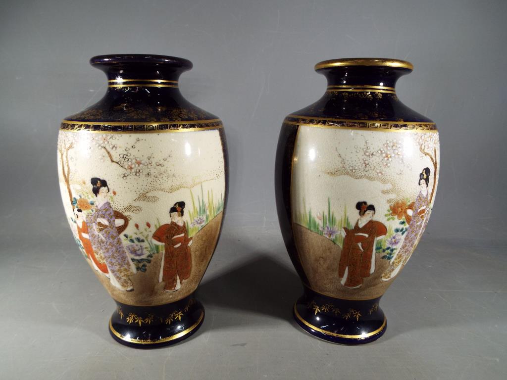 A pair of Kizan, Meiji period Satsuma, circular section,