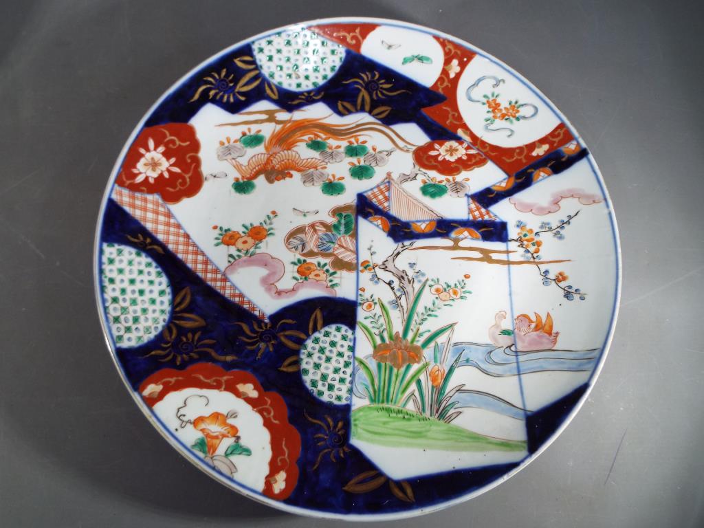 Two Japanese Imari chargers decorated with birds and floral motifs, - Image 2 of 8