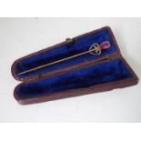 A bar brooch marked 9ct set with amethyst, approx weight 2.