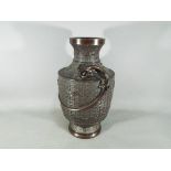 A Chinese 19th century bronze, archaistic style baluster vase,