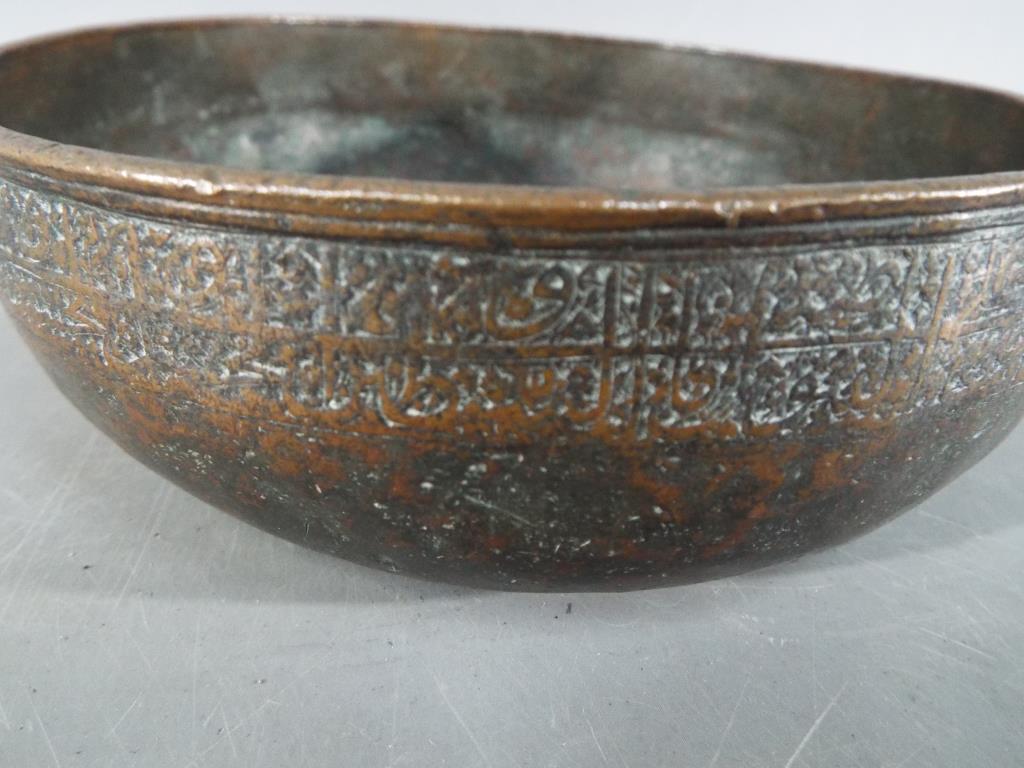 A Persian 14th century Timurid, tinned copper bowl of deep rounded form with slightly everted rim, - Image 5 of 6