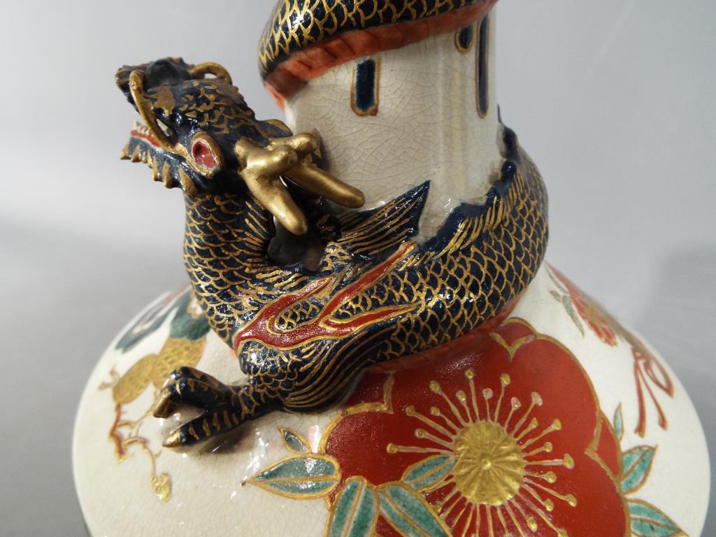 An unusual Meiji period Satsuma bottle vase by Kintozan with applied dragon coiled around the neck - Image 3 of 11