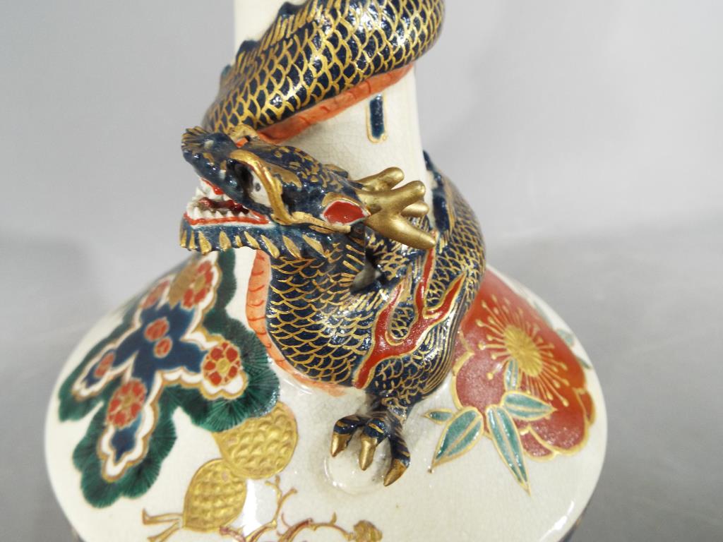 An unusual Meiji period Satsuma bottle vase by Kintozan with applied dragon coiled around the neck - Image 2 of 11