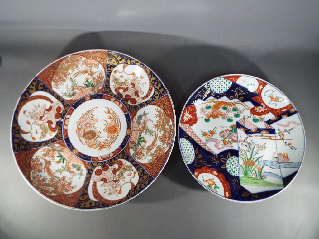 Two Japanese Imari chargers decorated with birds and floral motifs, - Image 8 of 8