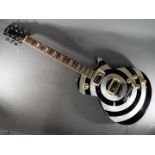 Indie Bullseye Les Paul electric guitar finished in contrasting champagne silver and black with