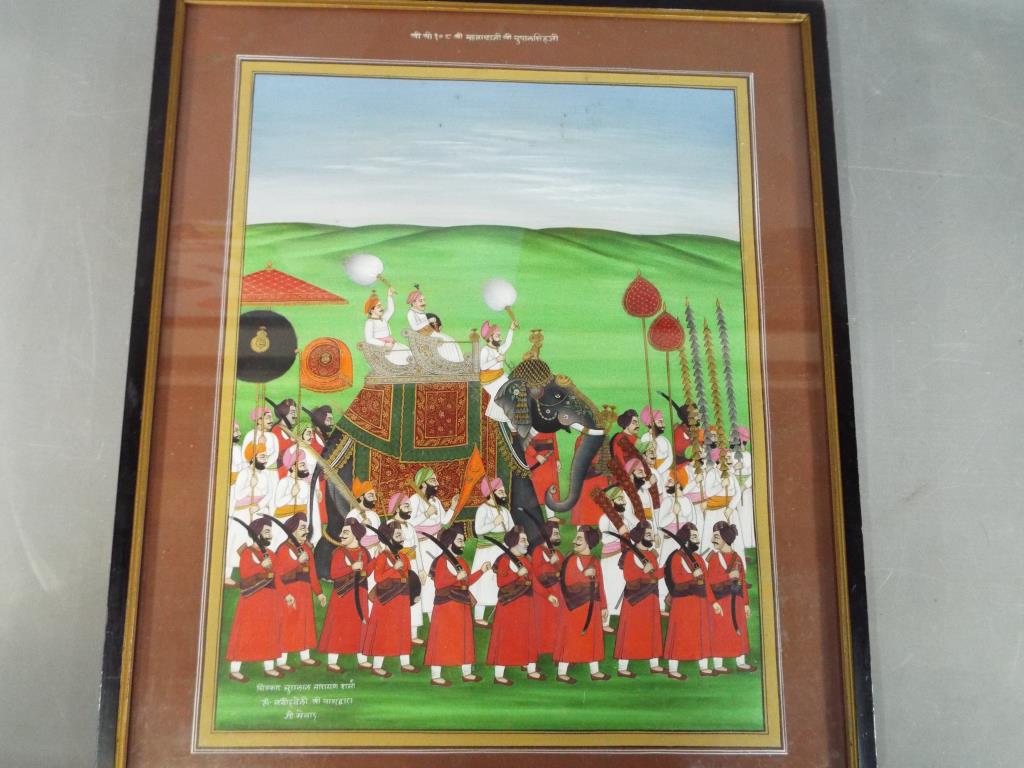 A framed painting depicting Maharana Bophal Singh riding in procession on an elephant,