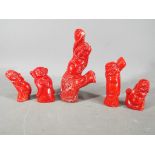 A set of five Chinese, red coral, carved Buddhas,