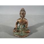 Buddha - A Chinese Tibetan 19th century, small bronze Buddhist figure in seated pose,