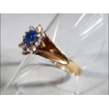 A 9ct hallmarked, flower head cluster ring, size P, approximately 2.48 grams total weight.