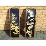 A pair of 19thC Japanese black lacquered panels with Shibayama decoration of birds in branches,
