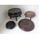 Three wooden oriental stands