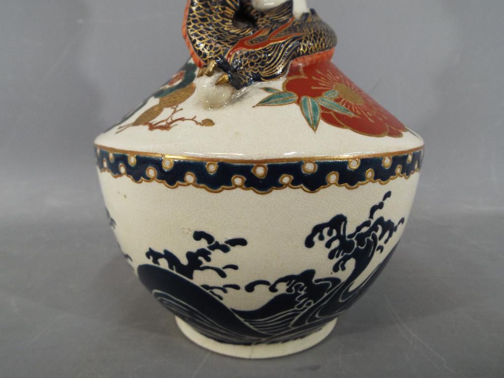 An unusual Meiji period Satsuma bottle vase by Kintozan with applied dragon coiled around the neck - Image 7 of 11