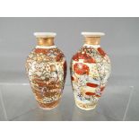 Two miniature Satsuma vases decorated on a cream coloured ground (2)