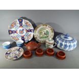 A collection of Oriental ceramics to include lidded bowl, Yixing Zisha teaset, covered cup,