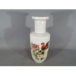 A Chinese famille rose vase decorated with flowers and rooster,