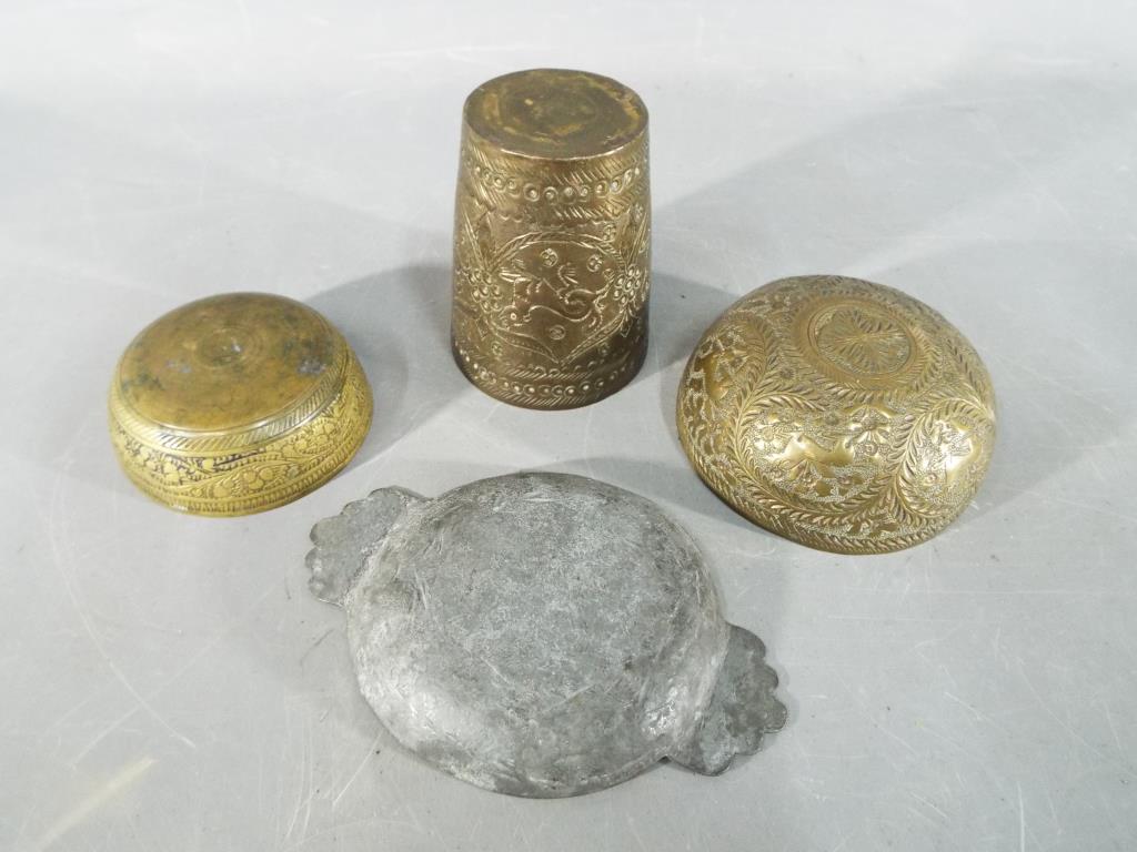 Four middle eastern metal dishes, comprising four bowls and a cup having chased decoration. - Image 2 of 6