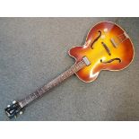 A vintage Hofner Senator bass guitar, sunburst finish, numbered 1375,