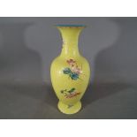 A 19th century Chinese famille rose sgraffito vase with everted rim,