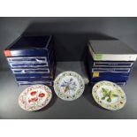 Fourteen boxed collector plates to include six Wedgwood 'The Flower Artists of Kew' and eight