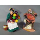 Royal Doulton - Two Royal Doulton figurines comprising Falstaff # HN2054 and The Old Balloon Seller
