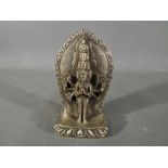 A 19th century Chinese Tibetan silver Avalokiteshvara altar ornament with engraved flower mark to