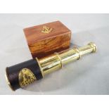 A cased brass marine telescope