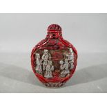A Chinese 19th century cinnabar lacquer snuff bottle of heart shaped form,