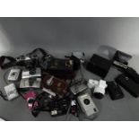 Photography - A collection of cameras to include a Kershaw eight-20 Penguin, Pentax K1000,