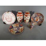 A collection of Oriental ceramics to include a pair of vases with bird and flower decoration,