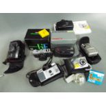 Photographic Equipment - A quantity of cameras and similar to include Canon, Olympus, Kodak,