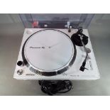 Pioneer DJ - A Pioneer direct drive turntable, model PLX-500, in white.