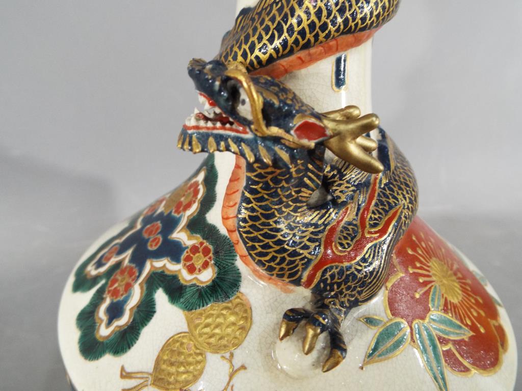 An unusual Meiji period Satsuma bottle vase by Kintozan with applied dragon coiled around the neck - Image 6 of 11