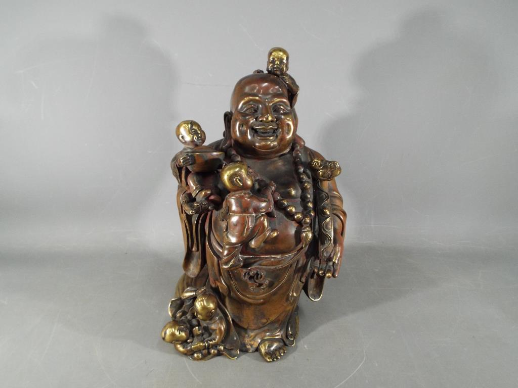 A large Chinese gilt bronze laughing Buddha with five children holding Ruyi sceptre, - Image 2 of 8
