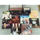 A collection of 33 RPM and 45 RPM vinyl records to include Blondie, Rod Stewart, ABBA, ELO,