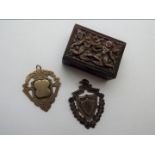 An Oriental embossed white metal matchbox holder (probably Indian silver), a hallmarked silver fob,