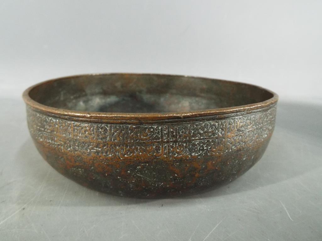 A Persian 14th century Timurid, tinned copper bowl of deep rounded form with slightly everted rim, - Image 6 of 6