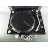 Pioneer - A Pioneer direct drive professional turntable, model PLX-1000, in black.