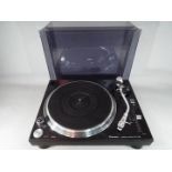 Pioneer - A Pioneer direct drive professional turntable, model PLX-1000, in black.