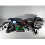Photography - A quantity of photographic equipment to include a Cosina CT4 camera, Agfa Isolette,