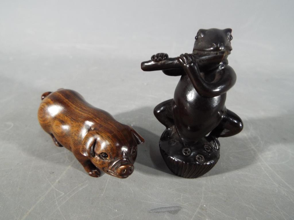 A vintage Japanese dark wood Netsuke dep