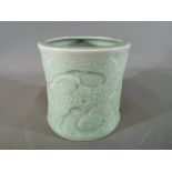 A Chinese or Japanese celadon glaze brus