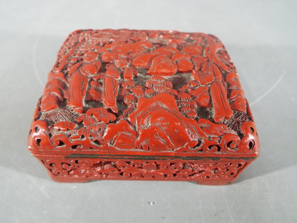 A Chinese cinnabar lacquer trinket box,