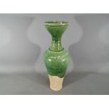 A Chinese Tang dynasty sancai glaze vase